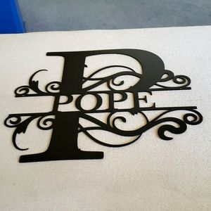 Power coated black metal name decor